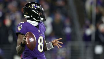 BALTIMORE, MARYLAND - JANUARY 20: Quarterback Lamar Jackson #8 of the Baltimore Ravens rolls out to pass against the Houston Texans at M&T Bank Stadium on January 20, 2024 in Baltimore, Maryland.   Rob Carr/Getty Images/AFP (Photo by Rob Carr / GETTY IMAGES NORTH AMERICA / Getty Images via AFP)