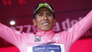 Colombia&#039;s Nairo Quintana of team Movistar celebrates the pink jersey of the overall leader on the podium after winning the 9th stage of the 100th Giro d&#039;Italia, Tour of Italy, cycling race from Montenero di Bisaccia to Blockhaus on May 14, 2017. 
 Colombia&#039;s Nairo Quintana soared to victory on a dramatic ninth stage of the Giro d&#039;Italia on Sunday to claim the race leader&#039;s pink jersey. Movistar&#039;s Quintana came over the finish line 23secs ahead of Frenchman Thibaut Pinot and Dutchman Tom Dumoulin, to wrest the race lead from Luxembourg&#039;s Bob Jungels.
  / AFP PHOTO / Luk BENIES