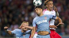 LeipzigxB4s Danish forward Yussuf Poulsen (R) and Monaco&#039;s Colombian forward Radamel Falcao vie for the ball during the Champions League group G football match RB Leipzig v AS Monaco in Leipzig, eastern Germany on September 13, 2017.  / AFP PHOTO / R