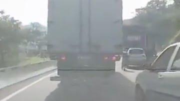 The drivers of the lorries cannot have seen him as he attempted to overtake and miraculously he got out of the situation seemingly unscathed.