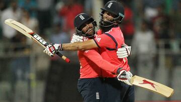 Adil Rashid left, celebrates with Moeen Ali after defeating South Africa. 