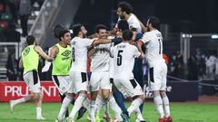 Egypt&#039;s players celebrate after winning the Africa Cup of Nations (CAN) 2021 semi-final football match between Cameroon and Egypt at Stade d&#039;Olembe in Yaounde on February 3, 2022. (Photo by Daniel BELOUMOU OLOMO / AFP)