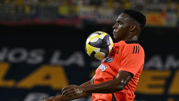 Colombia's defender #03 Jhon Lucumi controls the ball before the 2026 FIFA World Cup South American qualifiers football match between Colombia and Bolivia at the Roberto Melendez Metropolitan stadium in Barranquilla, Colombia on September 4, 2025. (Photo by Luis ACOSTA / AFP)