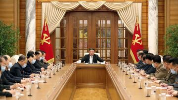 This picture taken and released from North Korea&#039;s official Korean Central News Agency (KCNA) on May 12, 2022 shows North Korean leader Kim Jong Un (C) attending the 8th political bureau meeting of the Workers Party of Korea (WPK)in Pyongyang. (Photo