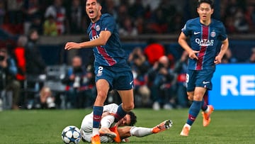 Paris Saint-Germain's Moroccan defender #02 Achraf Hakimi reacts as he is tackled by Bayern Munich's Colombian forward #14 Luis Diaz during the UEFA Champions League, league phase day 4, football match between Paris Saint-Germain (PSG) and FC Bayern Munich at the Parc des Princes in Paris, on November 4, 2025. (Photo by Anne-Christine POUJOULAT / AFP)