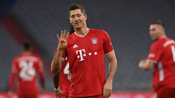 Bayern Munich's Polish forward Robert Lewandowski celebrates scoring from the penalty spot his team's forth goal to lead and win 4:3 during the German first division Bundesliga football match FC Bayern Munich vs Hertha Berlin on October 4, 2020