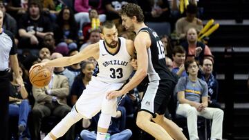 Dec 1, 2017; Memphis, TN, USA; Memphis Grizzlies center Marc Gasol (33) drives against San Antonio Spurs forward Pau Gasol (16) in the second half at FedExForum. Spurs won 95-79. Mandatory Credit: Nelson Chenault-USA TODAY Sports