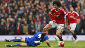 Britain Football Soccer - Manchester United v Leicester City - Barclays Premier League - Old Trafford - 1/5/16
 Manchester United&#039;s Marouane Fellaini in action with Leicester&#039;s Danny Drinkwater
 Action Images via Reuters / Jason Cairnduff
 Livepic
 EDITORIAL USE ONLY. No use with unauthorized audio, video, data, fixture lists, club/league logos or &quot;live&quot; services. Online in-match use limited to 45 images, no video emulation. No use in betting, games or single club/league/player publications.  Please contact your account representative for further details.