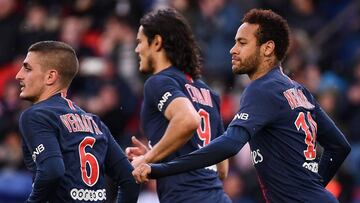 Paris Saint-Germain's Brazilian forward Neymar (R) celebrates after scoring a goal with Paris Saint-Germain's Italian midfielder Marco Verratti (L) and Paris Saint-Germain's Uruguayan forward Edinson Cavani (C) during the French L1 football