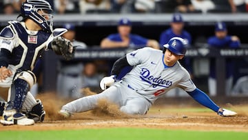 NEW YORK, NEW YORK - JUNE 09: Shohei Ohtani #17 of the Los Angeles Dodgers slides safely into home plate against the New York Yankees at Yankee Stadium on June 09, 2024 in the Bronx borough of New York City. Luke Hales/Getty Images/AFP (Photo by Luke Hales / GETTY IMAGES NORTH AMERICA / Getty Images via AFP)