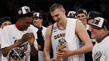 LOS ANGELES, CALIFORNIA - MAY 22: Nikola Jokic #15 of the Denver Nuggets celebrates with teammates after receiving the Most Valuable Player Trophy following game four of the Western Conference Finals against the Los Angeles Lakers at Crypto.com Arena on May 22, 2023 in Los Angeles, California. NOTE TO USER: User expressly acknowledges and agrees that, by downloading and or using this photograph, User is consenting to the terms and conditions of the Getty Images License Agreement.   Harry How/Getty Images/AFP (Photo by Harry How / GETTY IMAGES NORTH AMERICA / Getty Images via AFP)