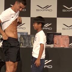 WATCH: Ronaldo compares abs with kid in Japan