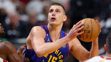 MIAMI, FLORIDA - JUNE 07: Nikola Jokic #15 of the Denver Nuggets drives the lane during the first quarter against the Miami Heat in Game Three of the 2023 NBA Finals at Kaseya Center on June 07, 2023 in Miami, Florida. NOTE TO USER: User expressly acknowledges and agrees that, by downloading and or using this photograph, User is consenting to the terms and conditions of the Getty Images License Agreement.   Mike Ehrmann/Getty Images/AFP (Photo by Mike Ehrmann / GETTY IMAGES NORTH AMERICA / Getty Images via AFP)