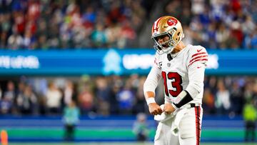 Oct 10, 2024; Seattle, Washington, USA; San Francisco 49ers quarterback Brock Purdy (13) celebrates after throwing a touchdown pass against the Seattle Seahawks during the third quarter at Lumen Field. Mandatory Credit: Joe Nicholson-Imagn Images