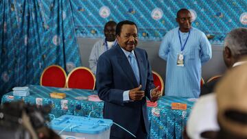 Cameroonian President Paul Biya, 92, who is seeking an eighth term reacts after he casted his ballot during the presidential election in Yaounde, Cameroon October 12, 2025. REUTERS/Zohra Bensemra