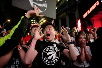 Fans celebrate after the Toronto Raptors defeated the Golden State Warriors in Oakland, California in Game Six of the best-of-seven NBA Finals, in Toronto, Ontario, Canada, June 14, 2019. 
