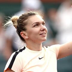 Halep overcomes stuttering start to progress at Indian Wells