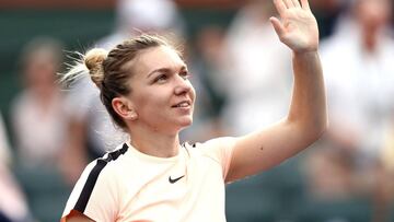 Halep overcomes stuttering start to progress at Indian Wells