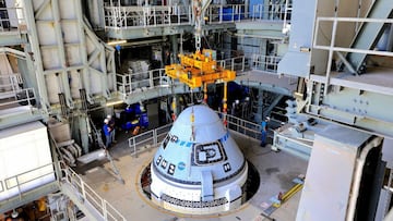 This photo obtained from NASA on July 25, 2021 shows Boeing&#039;s CST-100 Starliner spacecraft secured atop a United Launch Alliance Atlas V rocket.