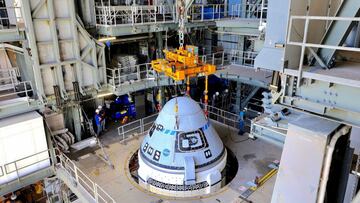 This photo obtained from NASA on July 25, 2021 shows Boeing's CST-100 Starliner spacecraft secured atop a United Launch Alliance Atlas V rocket.