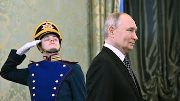 Russia's President Vladimir Putin walks past an honour guard during a meeting with Myanmar's military chief Senior General Min Aung Hlaing in Moscow, Russia, March 4, 2025. Sputnik/Sergei Bobylyov/Pool via REUTERS ATTENTION EDITORS - THIS IMAGE WAS PROVIDED BY A THIRD PARTY. TPX IMAGES OF THE DAY