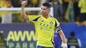 Nassr's Portuguese forward #7 Cristiano Ronaldo celebrates scoring his team's first goal during the Saudi Pro League football match between Al-Nassr and Al-Qadsiah at Al-Awwal Park in Riyadh on November 22, 2024. (Photo by Fayez NURELDINE / AFP)