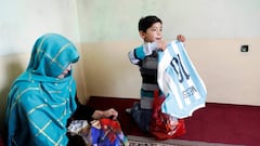 Afghan 'Messi boy' forced to flee home