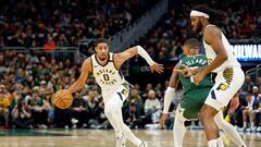 Jan 1, 2024; Milwaukee, Wisconsin, USA; Indiana Pacers guard Tyrese Haliburton (0) drives to the basket against the Milwaukee Bucks during the second half at Fiserv Forum. Mandatory Credit: Kamil Krzaczynski-USA TODAY Sports