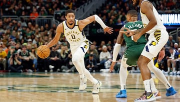 Indiana Pacers guard Tyrese Haliburton (0) drives to the basket against the Milwaukee Bucks.