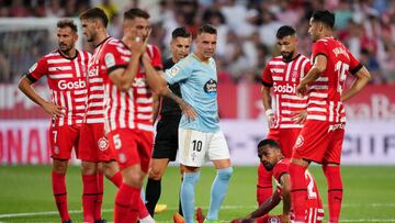 GIRONA, SPAIN - AUGUST 26: Yangel Herrera of Girona FC looks on while waiting for medical treatment during the LaLiga Santander match between Girona FC and RC Celta at Montilivi Stadium on August 26, 2022 in Girona, Spain. (Photo by Alex Caparros/Getty Images)