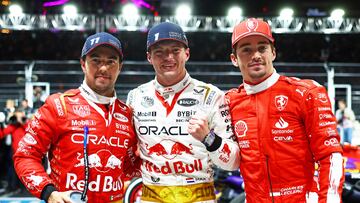 LAS VEGAS, NEVADA - NOVEMBER 18: Race winner Max Verstappen of the Netherlands and Oracle Red Bull Racing, Second placed Charles Leclerc of Monaco and Ferrari and Third placed Sergio Perez of Mexico and Oracle Red Bull Racing pose for a photo in parc ferme during the F1 Grand Prix of Las Vegas at Las Vegas Strip Circuit on November 18, 2023 in Las Vegas, Nevada.   Mark Thompson/Getty Images/AFP (Photo by Mark Thompson / GETTY IMAGES NORTH AMERICA / Getty Images via AFP)