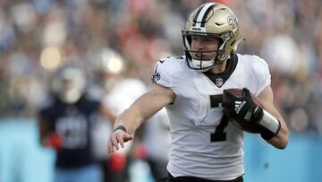 NASHVILLE, TENNESSEE - NOVEMBER 14: Taysom Hill #7 of the New Orleans Saints runs with the ball against the Tennessee Titans in the second half of the game at Nissan Stadium on November 14, 2021 in Nashville, Tennessee.   Wesley Hitt/Getty Images/AFP
 == 