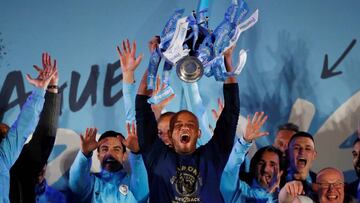 FILE PHOTO: Soccer Football - Manchester City Premier League Title Celebrations - Etihad Stadium, Manchester, Britain - May 12, 2019  Manchester City&#039;s Vincent Kompany celebrates winning the Premier League with the trophy  Action Images via Reuters/C