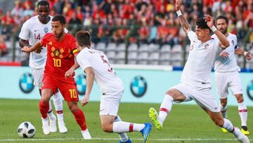 SL. Brussels (Belgium), 02/06/2018.- William Carvalho (L), Raphael Guerreiro (C) and Jose Fonte (R) of Portugal in action against Eden Hazard of Belgium (2-L) during the International Friendly soccer match between Belgium and Portugal at the King Baudouin stadium in Brussels, Belgium, 02 June 2018. (Bruselas, Bélgica, Futbol, Amistoso) EFE/EPA/STEPHANIE LECOCQ