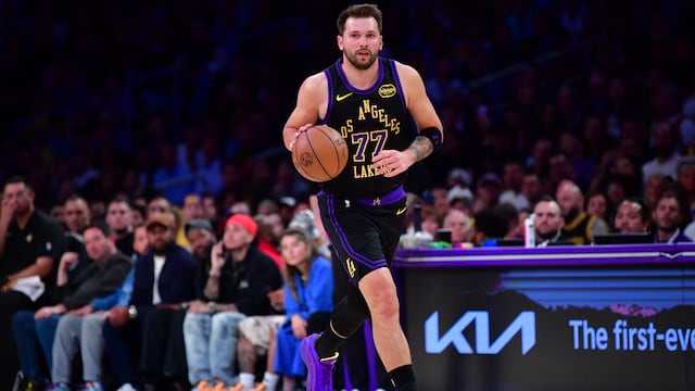 Mar 10, 2026; Los Angeles, California, USA; Los Angeles Lakers guard Luka Doncic (77) moves the ball up court against the Minnesota Timberwolves during the first half at Crypto.com Arena. Mandatory Credit: Gary A. Vasquez-Imagn Images