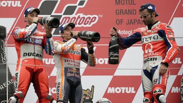 Petrucci con Dovizioso y M&aacute;rquez en el podio de Motegi.