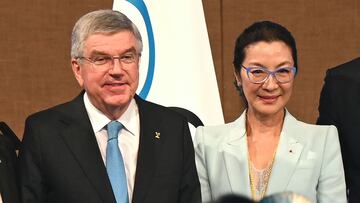 Newly elected International Olympic Committee (IOC) member Malaysian actress Michelle Yeoh (R) poses next to IOC President Thomas Bach during the third day of the 141st IOC session in Mumbai on October 17, 2023. Yeoh was voted onto the International Olympic Committee on October 17. The first Asian woman to win an Academy Award -- when she scooped best actress for "Everything Everywhere All at Once" earlier this year -- was elected by 67 votes to nine, with one abstention. (Photo by INDRANIL MUKHERJEE / AFP)