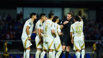Referee Drew Fishcer of Canada, Juan Sanchez, Jesus Angulo, Juan Brunetta, Javier Aquino of Tigres during the Semi-Finals second leg match between Cruz Azul and Tigres UANL as part of the CONCACAF Champions Cup 2025, at Olimpico Universitario Stadium on May 01, 2025 in Mexico City, Mexico.