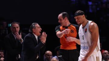 Real Madrid's head coach Sergio Scariolo (2-L) argues with a referee during the EuroLeague basketball match between Dubai Basketball and Olympiacos Piraeus in Dubai, United Arab Emirates, 05 February 2026.