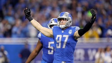 DETROIT, MICHIGAN - JANUARY 14: Aidan Hutchinson #97 of the Detroit Lions reacts after a sack during the first quarter against the Los Angeles Rams in the NFC Wild Card Playoffs at Ford Field on January 14, 2024 in Detroit, Michigan. Gregory Shamus/Getty Images/AFP (Photo by Gregory Shamus / GETTY IMAGES NORTH AMERICA / Getty Images via AFP)
