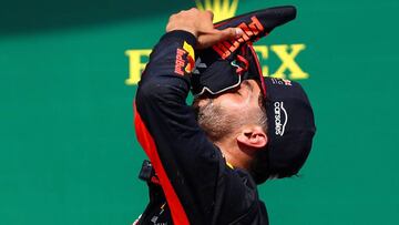 MONTREAL, QC - JUNE 11: Daniel Ricciardo of Australia and Red Bull Racing celebrates on the podium with a shoey after finishing third in the Canadian Formula One Grand Prix at Circuit Gilles Villeneuve on June 11, 2017 in Montreal, Canada. Dan Istitene/Getty Images/AFP
== FOR NEWSPAPERS, INTERNET, TELCOS & TELEVISION USE ONLY ==