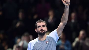 Croatia&#039;s Marin Cilic celebrates beating US player John Isner in their men&#039;s singles round-robin match on day four of the ATP World Tour Finals tennis tournament at the O2 Arena in London on November 14, 2018. (Photo by Glyn KIRK / AFP)