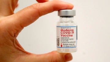 FILE PHOTO: A healthcare worker holds a vial of the Moderna COVID-19 Vaccine at a pop-up vaccination site operated by SOMOS Community Care during the coronavirus disease (COVID-19) pandemic in Manhattan in New York City, New York, U.S., January 29, 2021. REUTERS/Mike Segar/File Photo