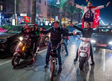 Locals celebrate in Marrakech after Morocco's victory over Ivory Coast in their FIFA 2018 World Cup Play-Off.