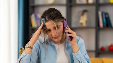 Worried woman call bank unable pay by card