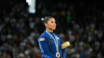 Bronze medallist US' Jordan Chiles poses during the podium ceremony for the artistic gymnastics women's floor exercise event of the Paris 2024 Olympic Games at the Bercy Arena in Paris, on August 5, 2024. (Photo by Gabriel BOUYS / AFP)