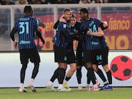 Inter Milan's Armenian forward #22 Henrikh Mkhitaryan (hidden) celebrates with teammates after scoring during the Italian Serie A football match Lecce vs Inter Milan at the Via del Mare stadium in Lecce, on February 21, 2026. (Photo by ABBONDANZA SCURO LEZZI / ANSA / AFP) / Italy OUT / ----IMAGE RESTRICTED TO EDITORIAL USE - STRICTLY NO COMMERCIAL USE-----