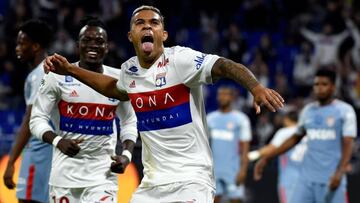 Lyon's Spanish forward Mariano Diaz celebrates after scoring a goal during the French L1 football match between Lyon (OL) and Monaco (ASM), on October 13, 2017 at the Groupama stadium in Decines-Charpieu near Lyon, southeastern France. / AFP PHOTO / JEAN-PHILIPPE KSIAZEK