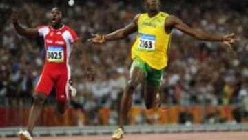 El trinitense Richard Thompson (izquierda) en la final ol&iacute;mpica de 100 metros de Pwek&iacute;n 2008, en la que se impuso el jamaicano Usain Bolt. 