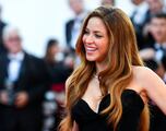 What is Shakira accused of and why is she ordered to stand trial in Spain?